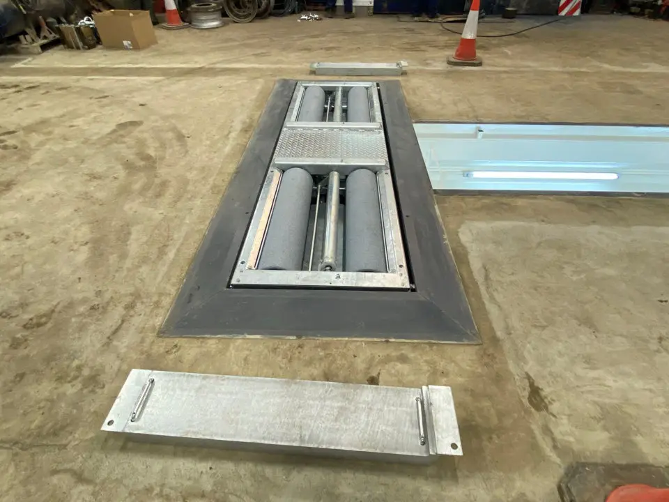 Brake testers for road maintenance vehicles