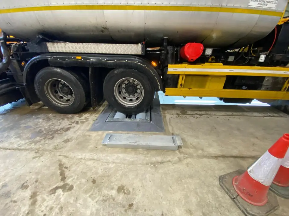 Brake testers for road maintenance vehicles
